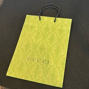 Gucci green paper shopping bag